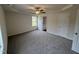 Main bedroom with carpet, ceiling fan, and en-suite bathroom at 378 Magnolia Run Way, Benson, NC 27504