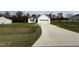 White house exterior with a two-car garage and driveway at 378 Magnolia Run Way, Benson, NC 27504