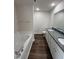 Bathroom with double vanity, granite countertop, and bathtub at 378 Magnolia Run Way, Benson, NC 27504