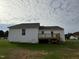 White house exterior with deck at 378 Magnolia Run Way, Benson, NC 27504
