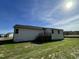 White house exterior with deck and grassy yard at 79 Tulipfield Way, Benson, NC 27504