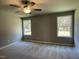 Spacious bedroom with carpet and ceiling fan at 79 Tulipfield Way, Benson, NC 27504