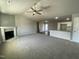 Spacious living room with a fireplace and an open floor plan at 79 Tulipfield Way, Benson, NC 27504