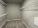 Walk-in closet with wire shelving at 79 Tulipfield Way, Benson, NC 27504