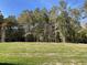 Wooded lot with grassy area at 79 Tulipfield Way, Benson, NC 27504