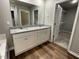 Double vanity bathroom with granite counters at 79 Tulipfield Way, Benson, NC 27504