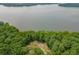 An aerial view of a wooded lot on the lake, ready to build at 017 Bartley Holleman Rd # 17, New Hill, NC 27562