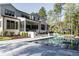 Home's backyard features a large pool and spacious patio area at 017 Bartley Holleman Rd # 17, New Hill, NC 27562