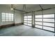 Spacious three-car garage with glass doors at 013 Bartley Holleman Rd # 13, New Hill, NC 27562