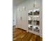 White kitchen pantry with glass-front cabinets and ample storage at 013 Bartley Holleman Rd # 13, New Hill, NC 27562