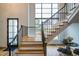 Modern staircase with black metal railings and wood steps at 013 Bartley Holleman Rd # 13, New Hill, NC 27562