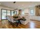 Modern kitchen with island, breakfast nook, and access to backyard patio at 013 Bartley Holleman Rd # 13, New Hill, NC 27562