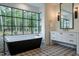 Luxurious bathroom with soaking tub and forest views at 013 Bartley Holleman Rd # 13, New Hill, NC 27562