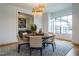 Elegant dining room with a round table and statement chandelier at 013 Bartley Holleman Rd # 13, New Hill, NC 27562