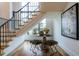 Bright landing with a round table, seating, and large artwork at 013 Bartley Holleman Rd # 13, New Hill, NC 27562