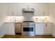 Modern kitchen with stainless steel appliances and white cabinets at 013 Bartley Holleman Rd # 13, New Hill, NC 27562