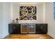 Custom wine cellar with a unique art piece and wine cooler at 013 Bartley Holleman Rd # 13, New Hill, NC 27562
