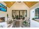 Covered patio with fireplace and sliding glass doors leading to the interior at 013 Bartley Holleman Rd # 13, New Hill, NC 27562