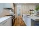 Modern kitchen with stainless steel appliances and white cabinetry at 013 Bartley Holleman Rd # 13, New Hill, NC 27562