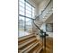 Modern staircase with black metal railings and gold accents at 013 Bartley Holleman Rd # 13, New Hill, NC 27562