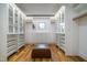 Spacious walk-in closet with ample shelving and drawers at 013 Bartley Holleman Rd # 13, New Hill, NC 27562