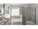 Spa-like bathroom with soaking tub and walk-in shower at 734 Apple Churn Dr, Fuquay Varina, NC 27526