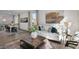Spacious living room with a neutral color palette and ample natural light at 734 Apple Churn Dr, Fuquay Varina, NC 27526