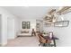 Cozy office space with a desk, shelving, and comfortable seating at 1915 Puffin Dr # 198, Haw River, NC 27258