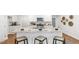 Modern kitchen with white cabinets, granite countertops, and stainless steel appliances at 1915 Puffin Dr # 198, Haw River, NC 27258