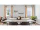 Dining room with hardwood floors and large windows at 1915 Puffin Dr # 198, Haw River, NC 27258