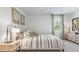 Spacious bedroom with a comfortable bed and plenty of light at 1915 Puffin Dr # 198, Haw River, NC 27258