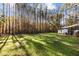 Large backyard with shed and deck, perfect for outdoor entertaining at 4321 S Greg Allen Way, Oxford, NC 27565