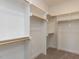 Large walk-in closet with ample shelving and hanging rods at 101 Asti Ct, Clayton, NC 27527