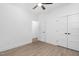 Spacious bedroom with double door closet and ceiling fan at 329 & 331 Roxboro St, Haw River, NC 27258