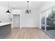 Light-filled dining area with sliding glass doors to backyard at 329 & 331 Roxboro St, Haw River, NC 27258