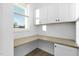 Home office with built-in desk and cabinets at 329 & 331 Roxboro St, Haw River, NC 27258