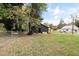 Dark gray house exterior with a fenced yard at 617 Orange Heights Loop Rd, Hillsborough, NC 27278