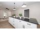 Spacious kitchen with an island and white cabinetry at 617 Orange Heights Loop Rd, Hillsborough, NC 27278