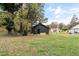 Dark gray house exterior with a grassy yard at 617 Orange Heights Loop Rd, Hillsborough, NC 27278