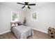 Cozy bedroom with a twin bed and cheerful decor at 617 Orange Heights Loop Rd, Hillsborough, NC 27278