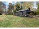 Dark gray house exterior with front porch at 617 Orange Heights Loop Rd, Hillsborough, NC 27278