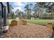 Landscaped backyard with garden boxes and a shed at 617 Orange Heights Loop Rd, Hillsborough, NC 27278