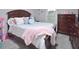 Bedroom with a dresser and pink throw blanket at 30 Willow Bend Dr, Youngsville, NC 27596