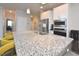 Granite island kitchen with stainless steel appliances at 30 Willow Bend Dr, Youngsville, NC 27596