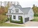 Gray house with a two-car garage and landscaping at 30 Willow Bend Dr, Youngsville, NC 27596