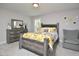 Cozy bedroom with dresser and comfortable seating at 30 Willow Bend Dr, Youngsville, NC 27596