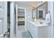 Bathroom with double vanity and access to bedroom at 30 Willow Bend Dr, Youngsville, NC 27596