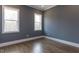 Bright bedroom with hardwood floors and large windows at 370 Bellini Dr, Clayton, NC 27527