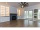 Spacious living room with fireplace, built-in shelves, and hardwood floors at 370 Bellini Dr, Clayton, NC 27527