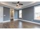 Main bedroom with hardwood floors, recessed lighting, and an ensuite bathroom at 370 Bellini Dr, Clayton, NC 27527